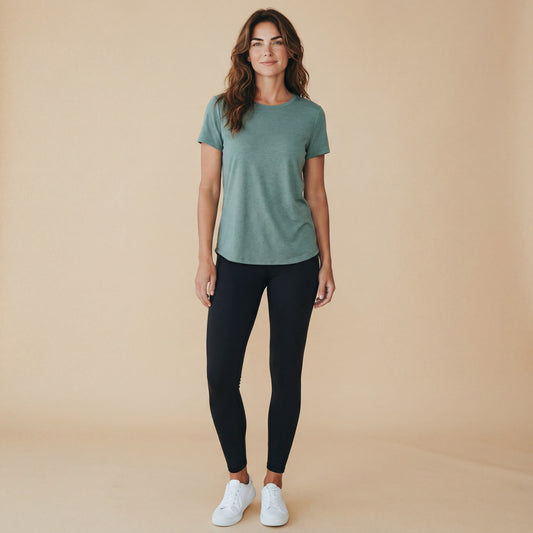 Women's back-cross cut-out tee, front view with crew neck and relaxed fit in sage green