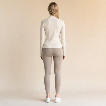 Slim-fit quarter-zip top, back view showing ribbed back yoke and princess-seam shaping