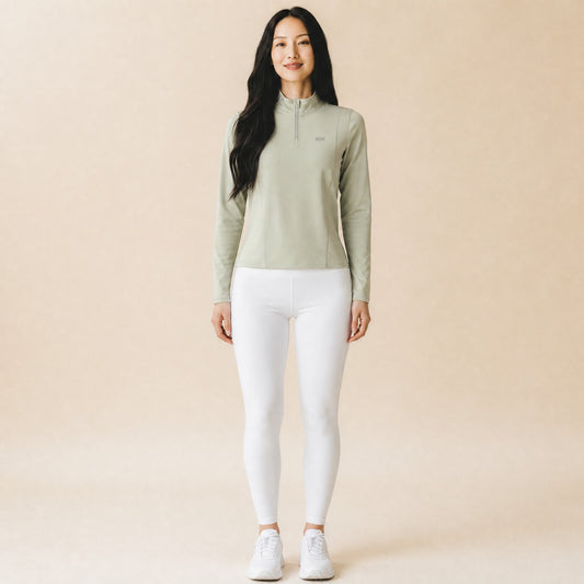 Women's quarter-zip stand-collar long-sleeve top, front view with chest logo print