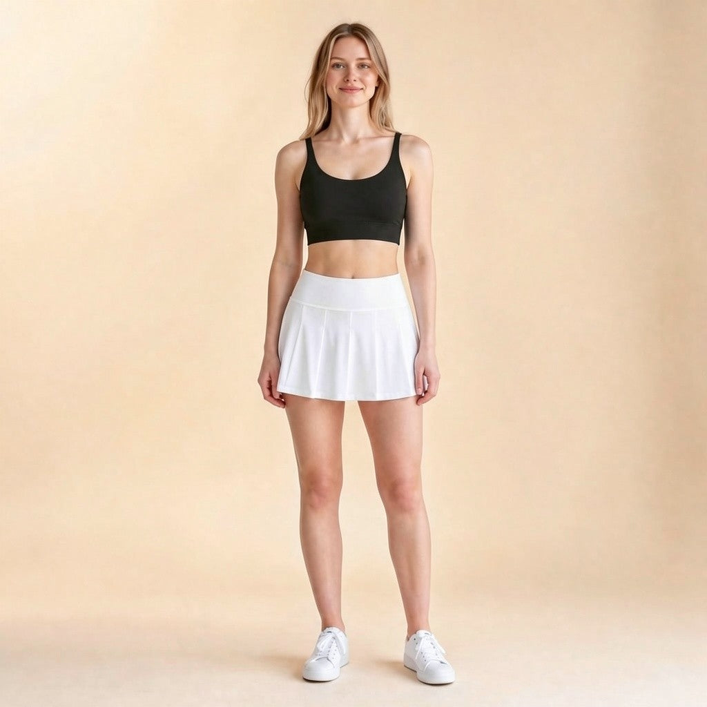 Light-support yoga bralette in black, strappy cross-back crop top, front view