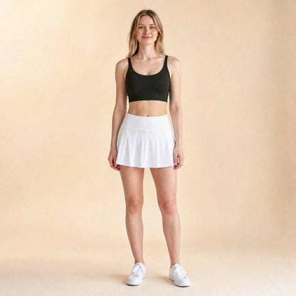 Light-support yoga bralette in black, strappy cross-back crop top, front view