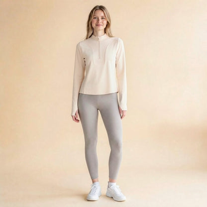 Women's stand-collar quarter-zip athletic top, four-way-stretch knit detail