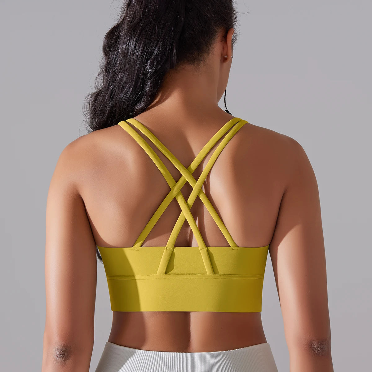 Sports bra back view – hollow cross-back design for ventilation