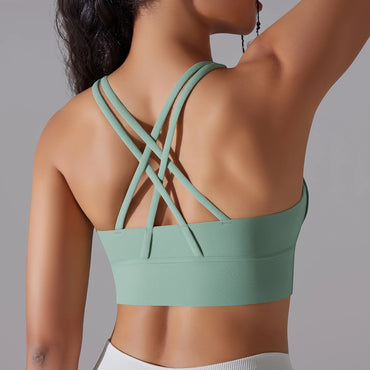 Cross-back sports bra front view – high-stretch activewear for yoga
