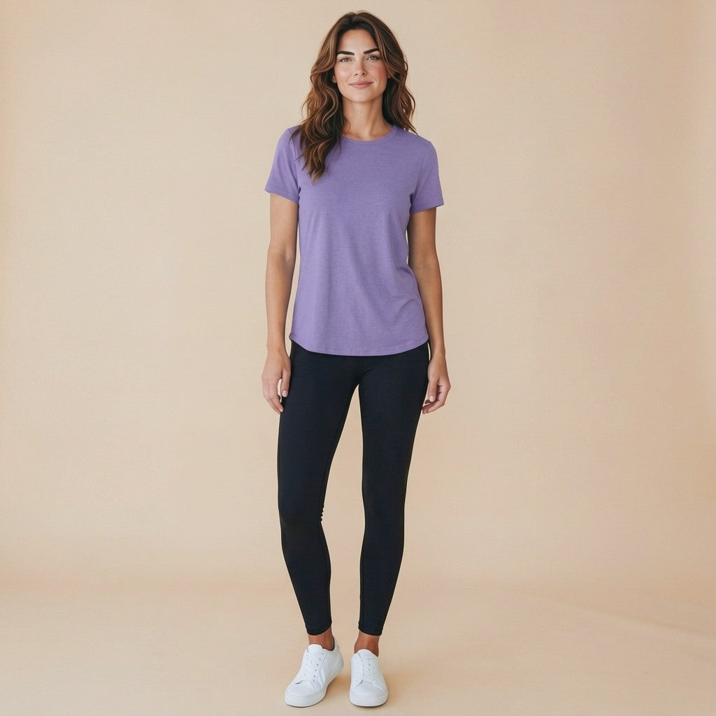 Quick-dry yoga tee with back-cross cut-out, shown in deep green