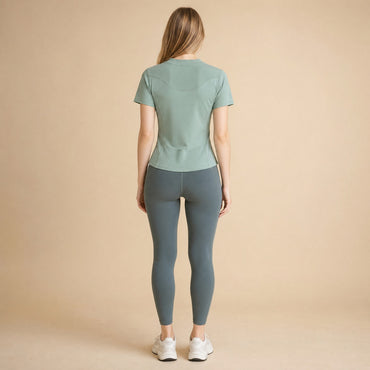 Short-sleeve training top, back view showing ribbed back yoke panel