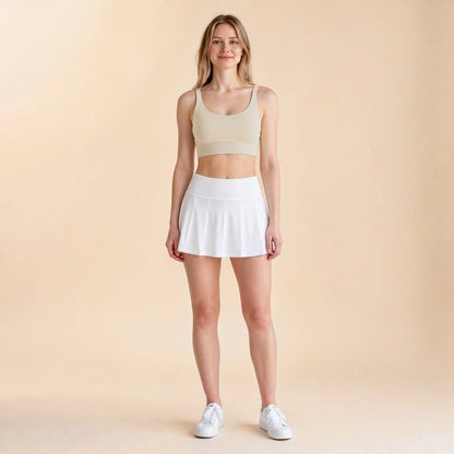 Scoop-neck yoga bralette in beige, light-support cross-back crop top, front view